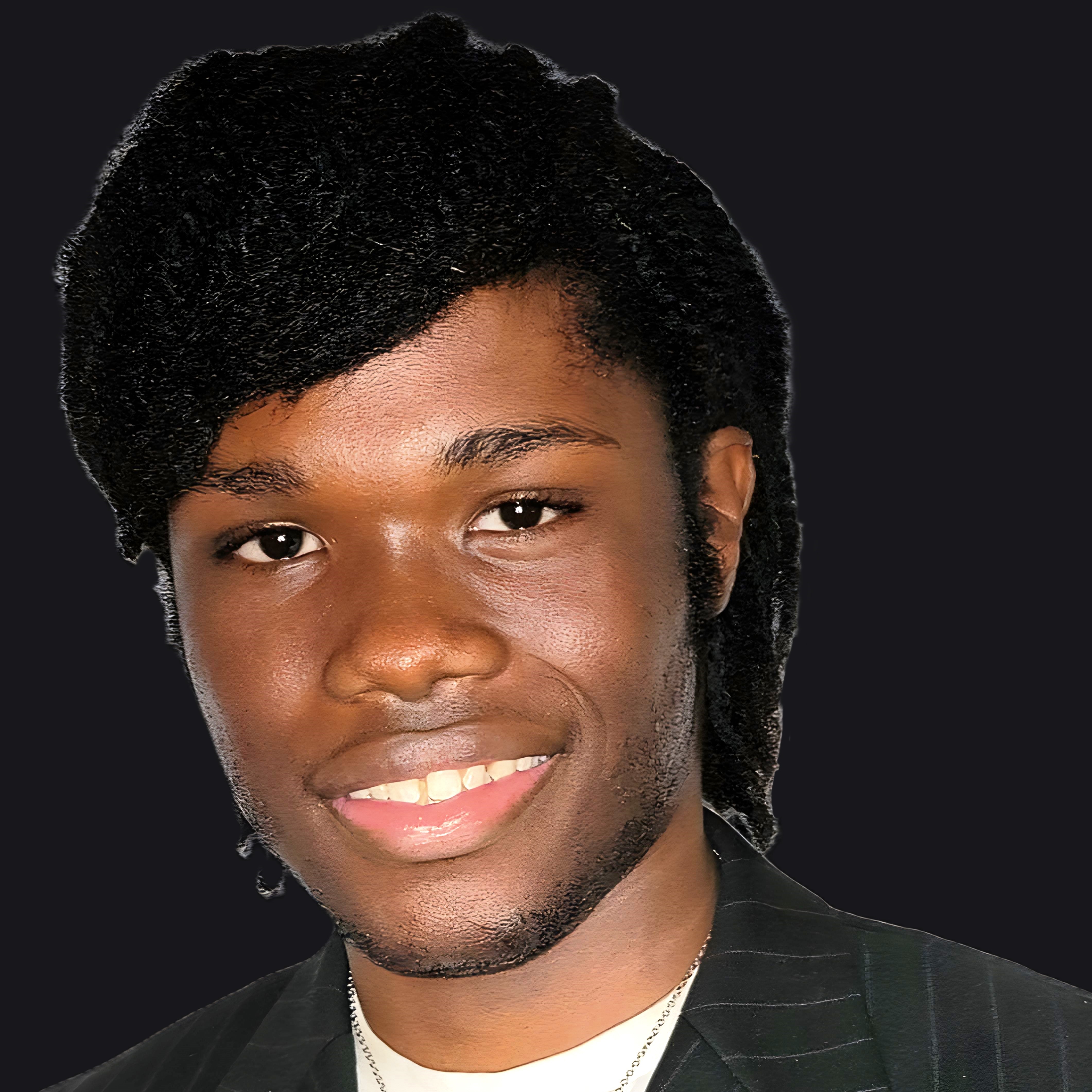 Headshot portrait of Marcel Cato